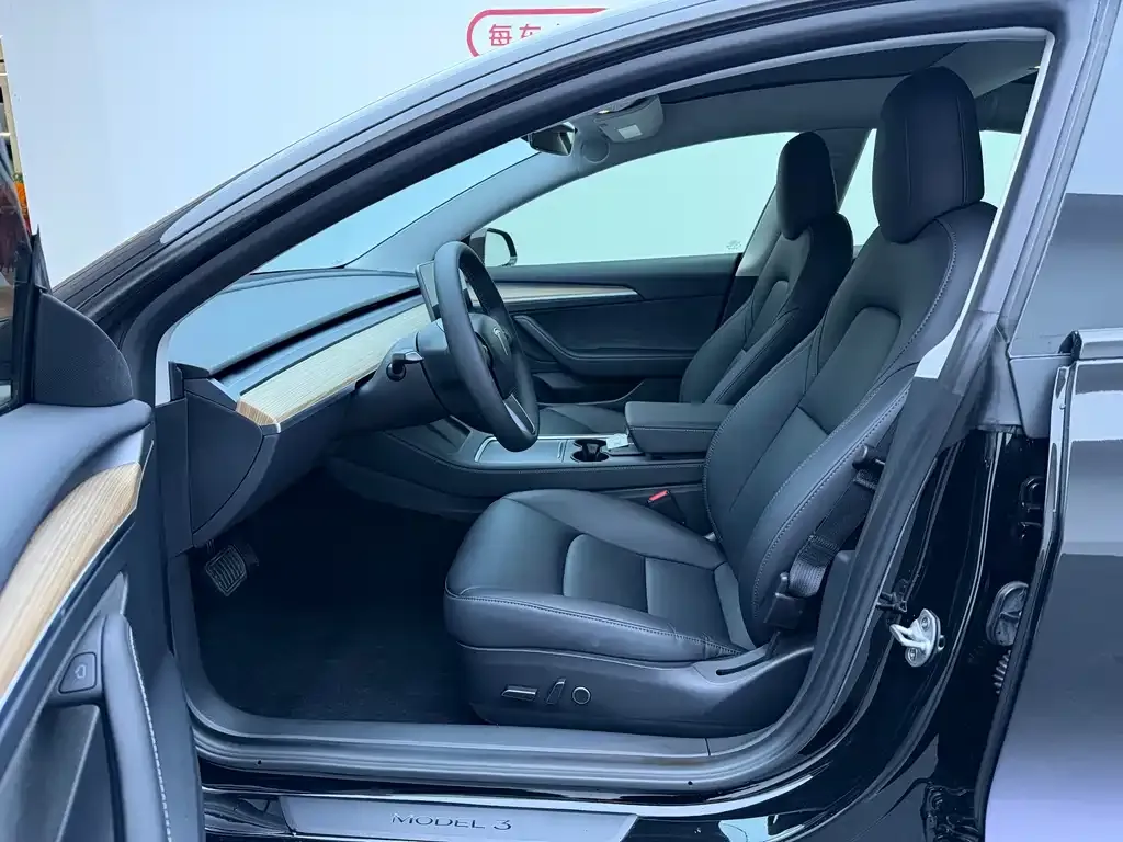 Tesla Model 3 — фото 10