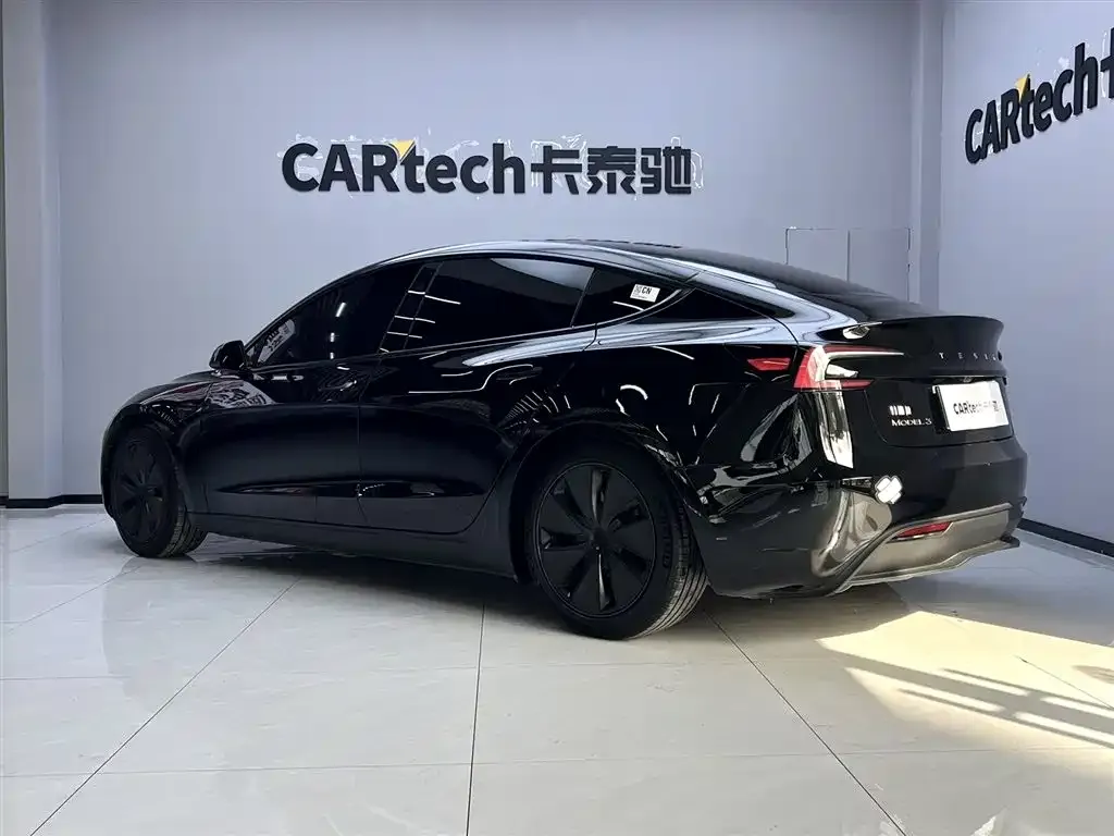 Tesla Model 3 — фото 9
