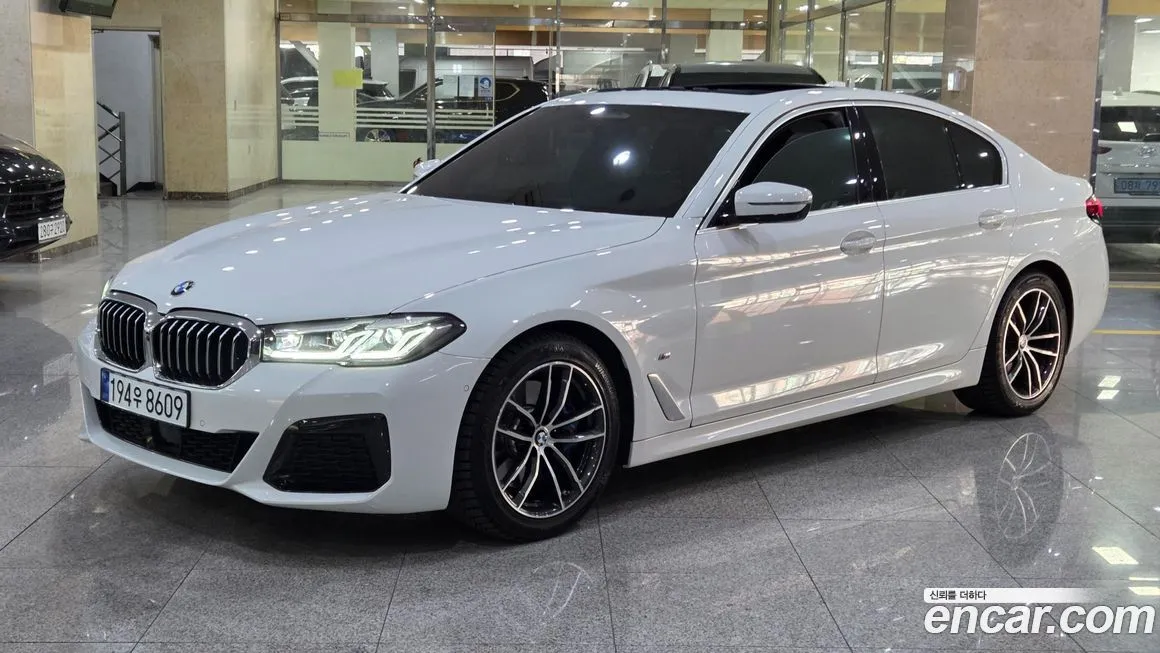 BMW 5-Series — фото 1