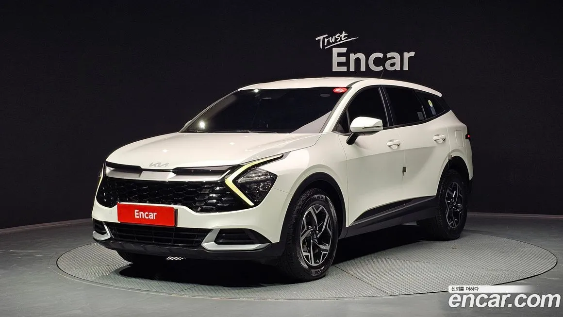 Kia Sportage — фото 1
