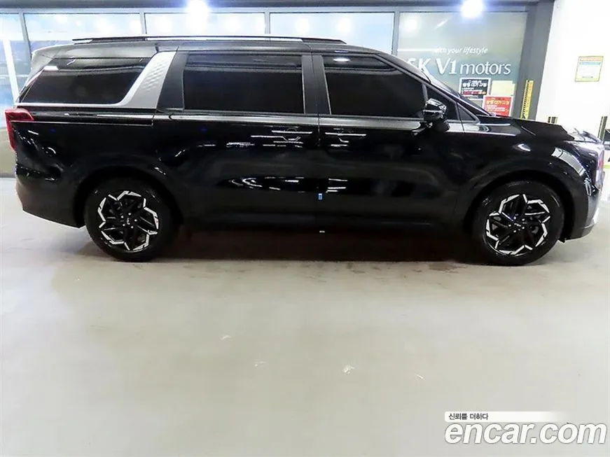 Kia Carnival — фото 10