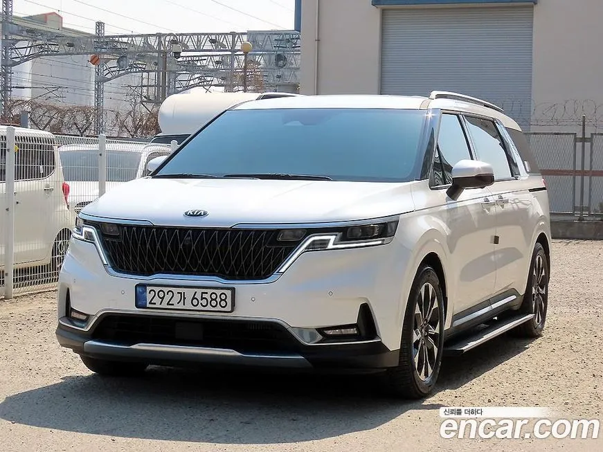 Kia Carnival — фото 10