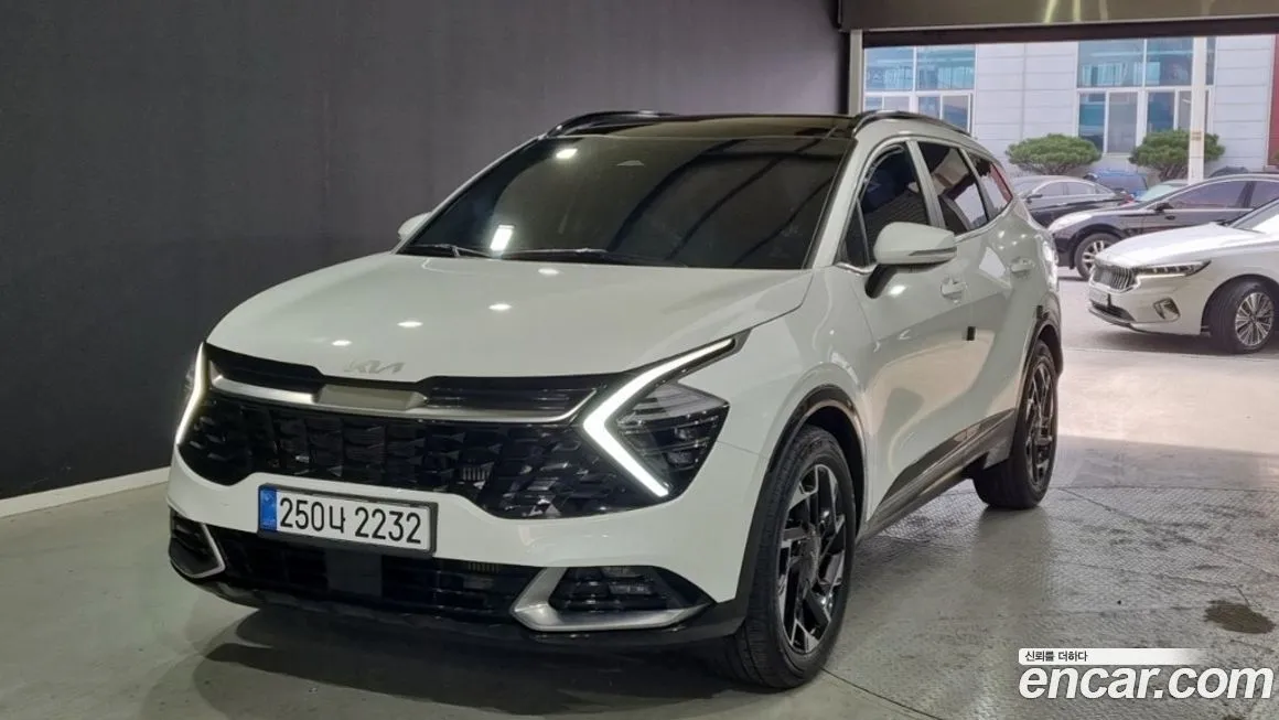 Kia Sportage — фото 1