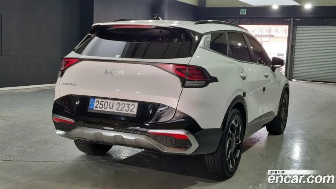 Kia Sportage — фото 7