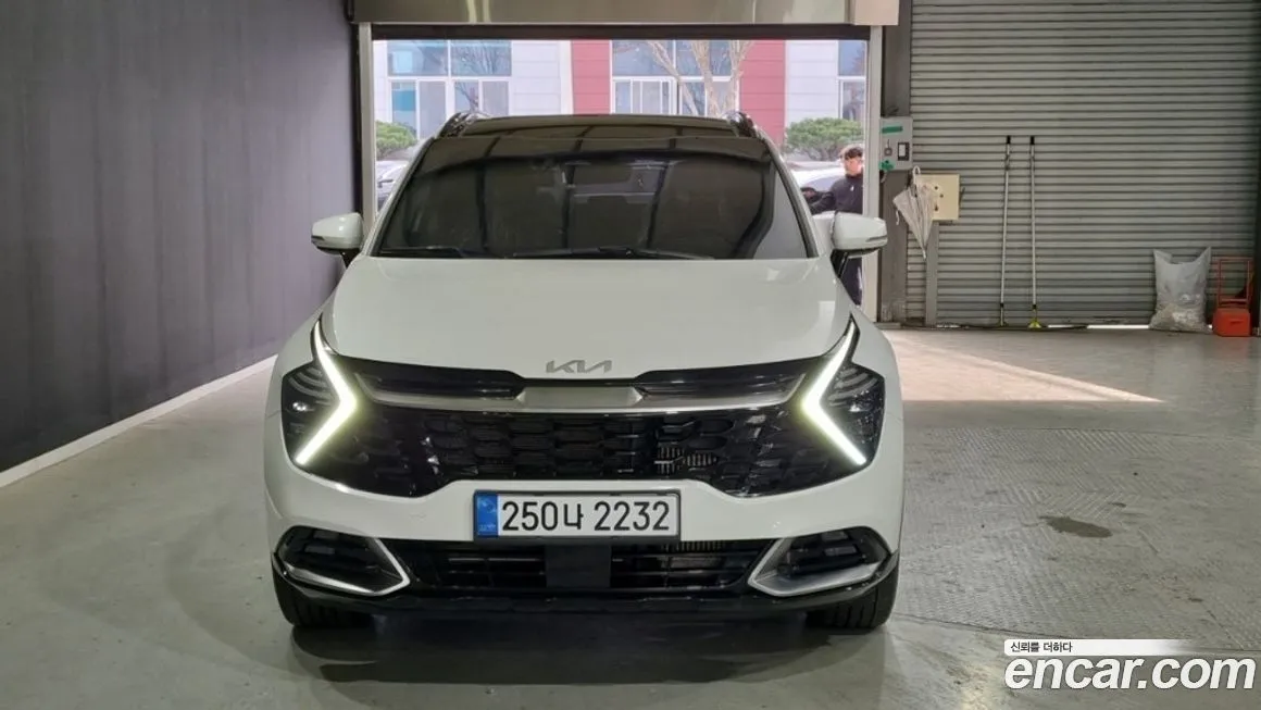 Kia Sportage — фото 10