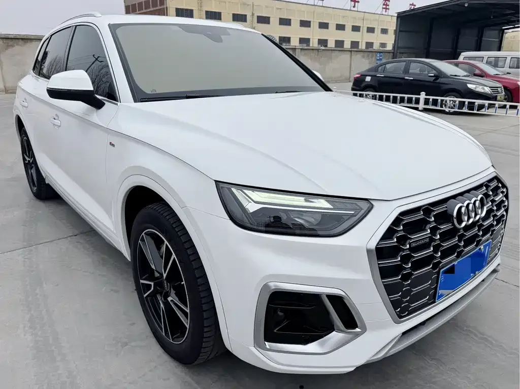 Audi Q5L — фото 8