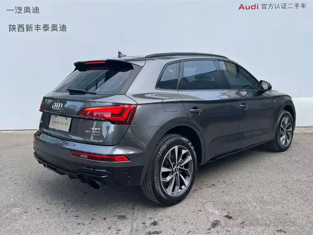 Audi Q5L — фото 10