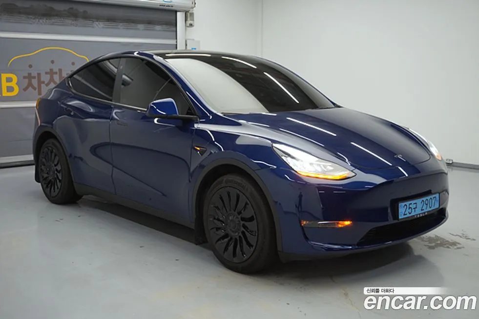 Tesla Model Y — фото 7