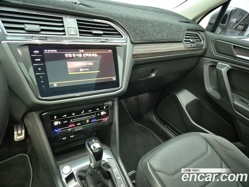 Volkswagen Tiguan — фото 10