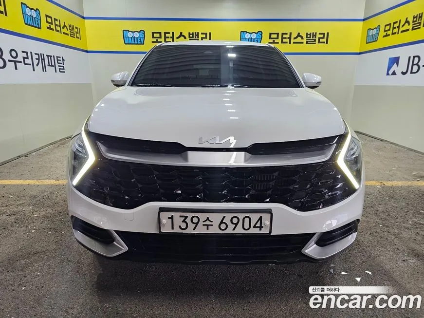 Kia Sportage — фото 1
