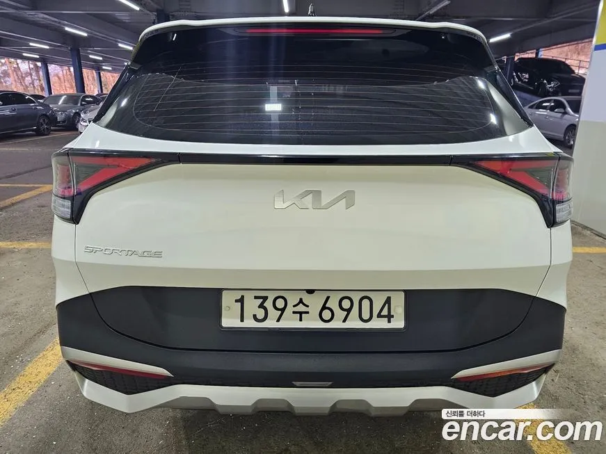 Kia Sportage — фото 6