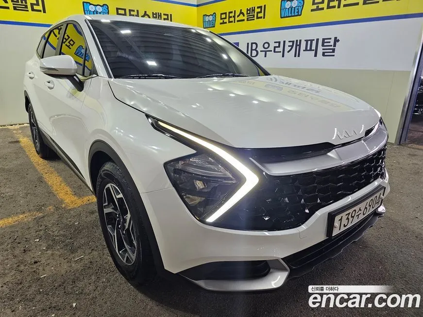 Kia Sportage — фото 7