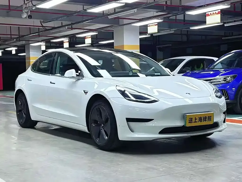 Tesla Model 3 — фото 5
