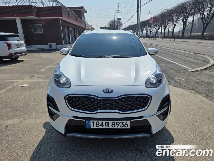 Kia Sportage — фото 1