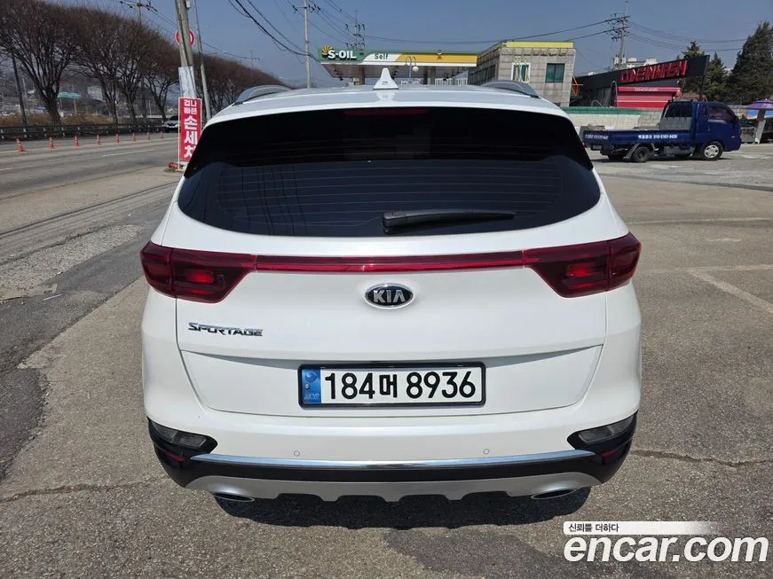 Kia Sportage — фото 9
