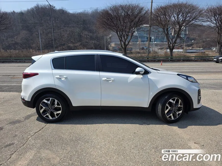 Kia Sportage — фото 10