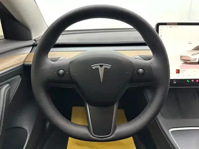 Tesla Model 3 — фото 7