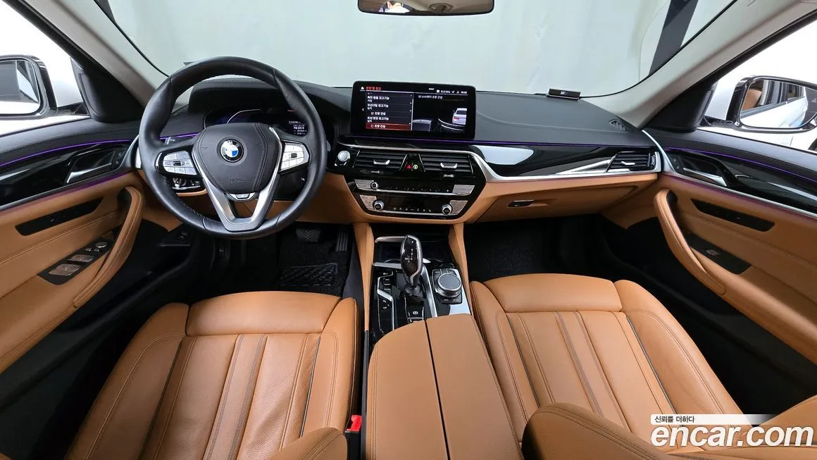 BMW 5-Series — фото 10