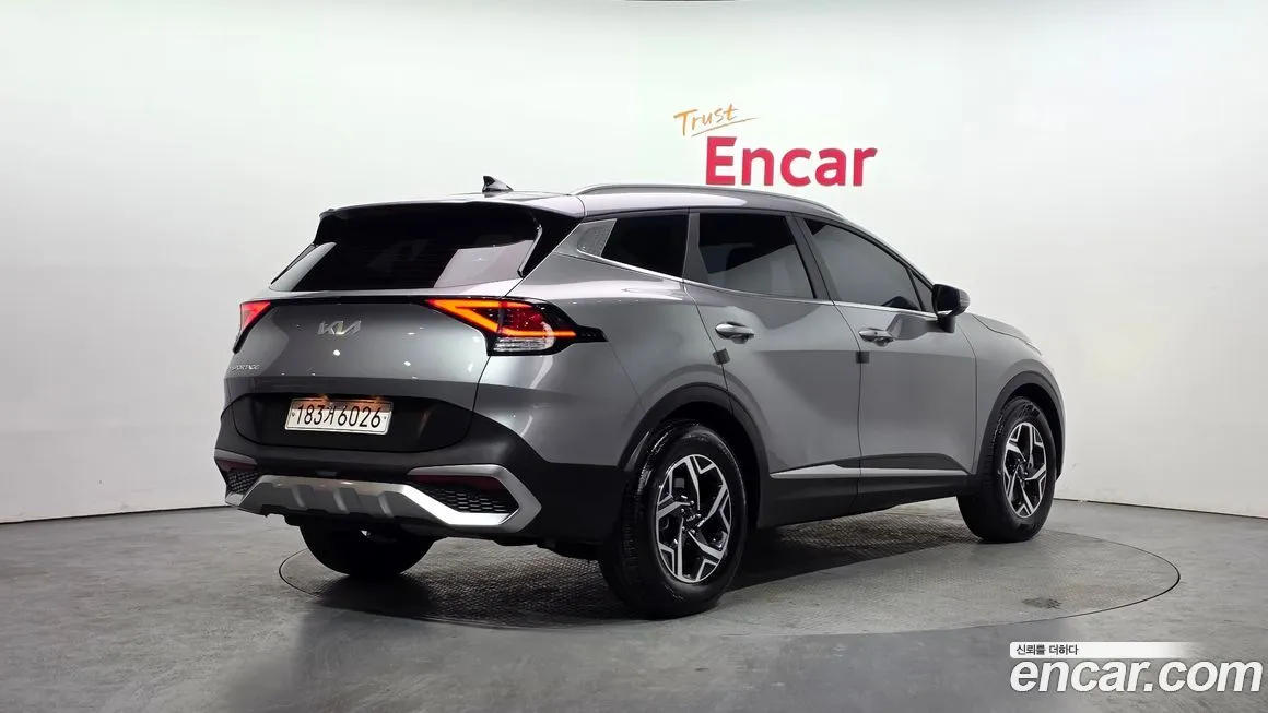 Kia Sportage — фото 7