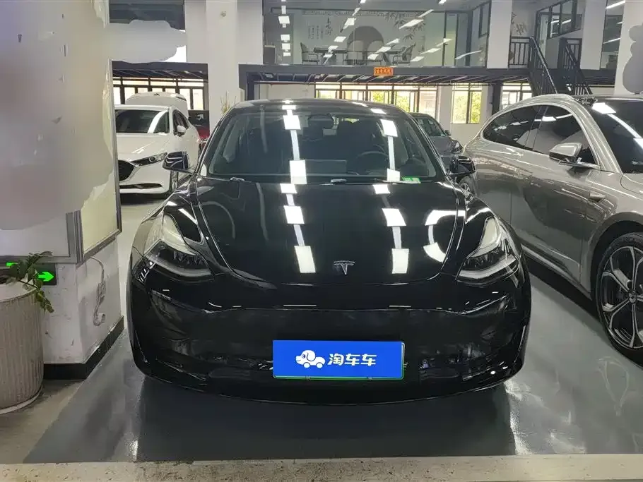 Tesla Model 3 — фото 5