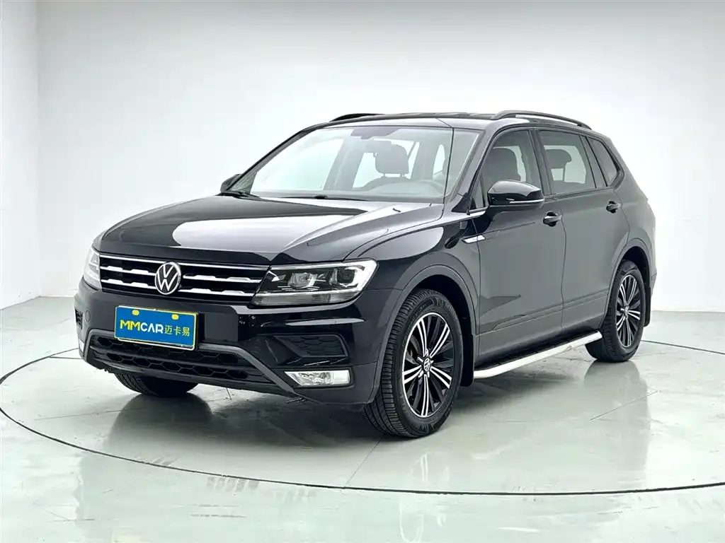 Volkswagen Tiguan L — фото 1