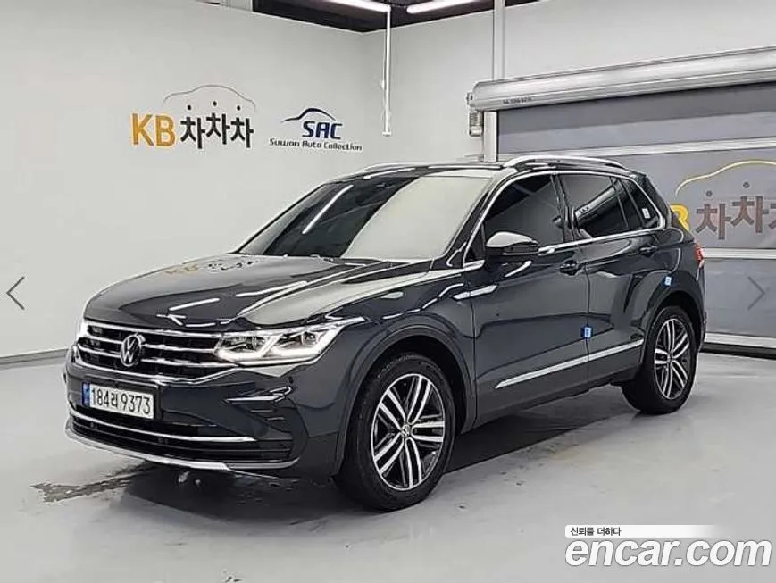Volkswagen Tiguan — фото 1