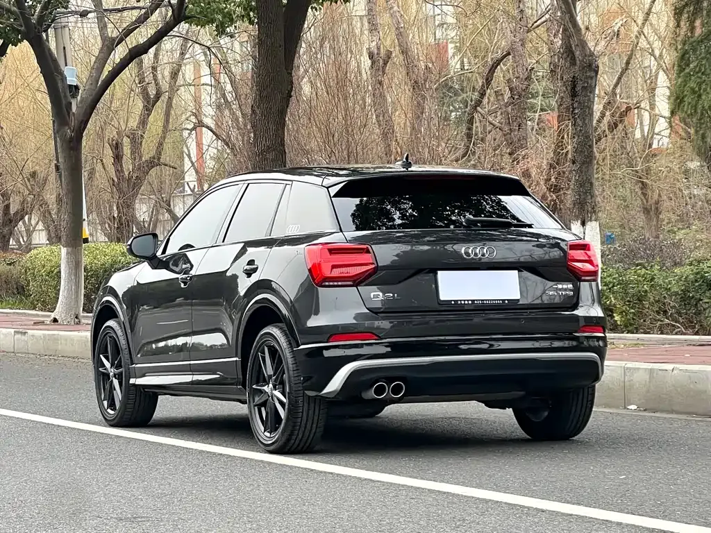 Audi Q2L — фото 4