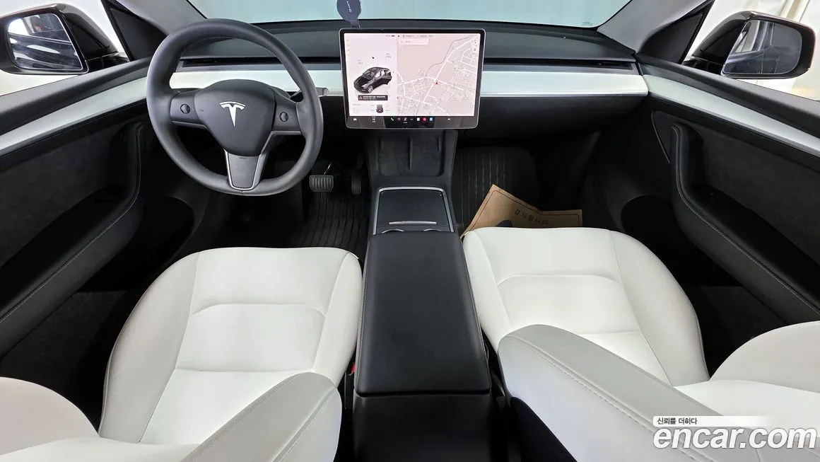 Tesla Model Y — фото 10