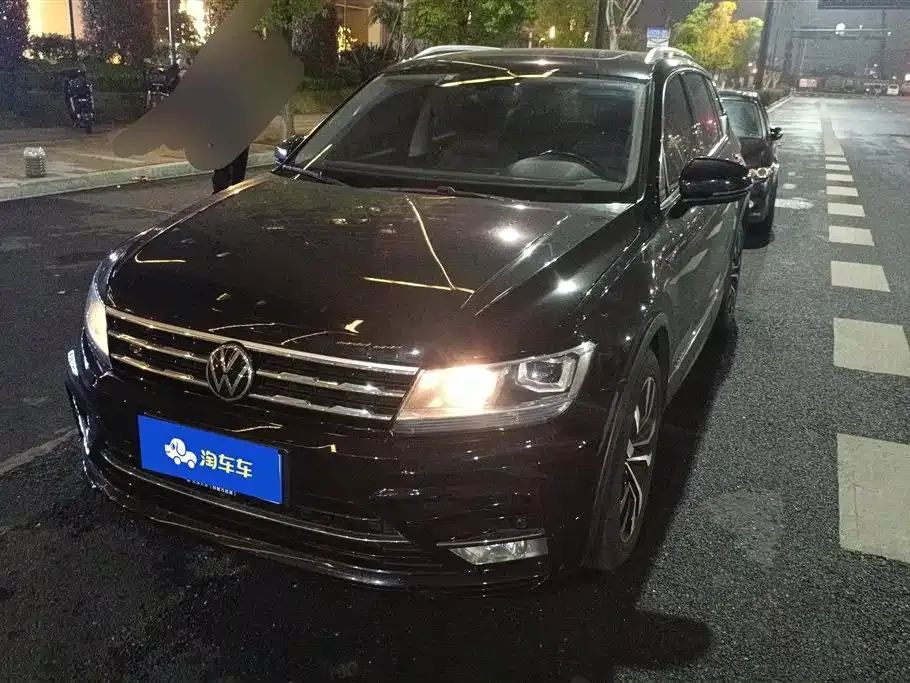 Volkswagen Tiguan L — фото 1
