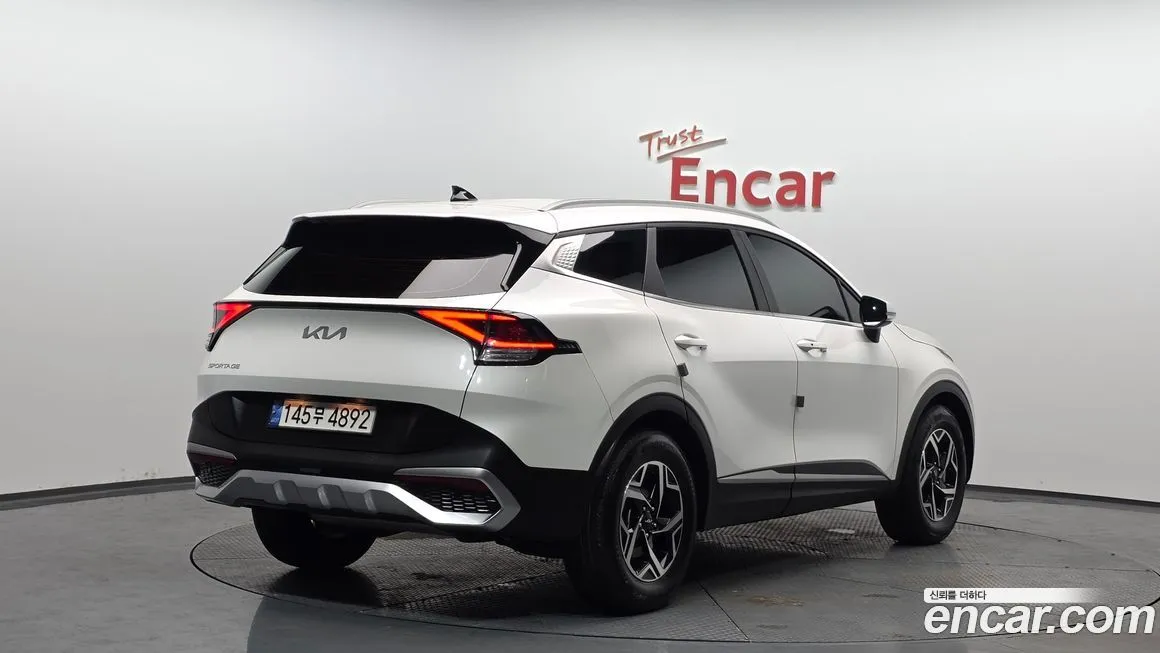 Kia Sportage — фото 10