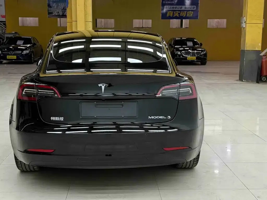 Tesla Model 3 — фото 6