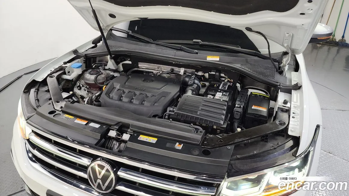 Volkswagen Tiguan — фото 10