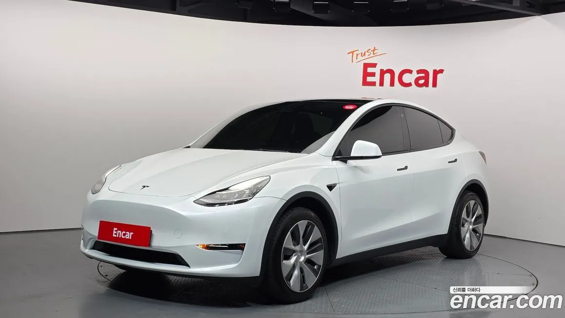 Tesla Model Y — фото 1