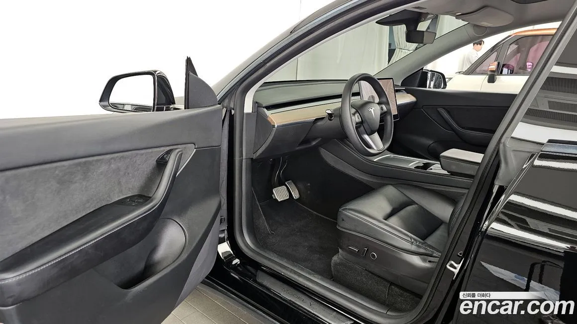 Tesla Model Y — фото 9
