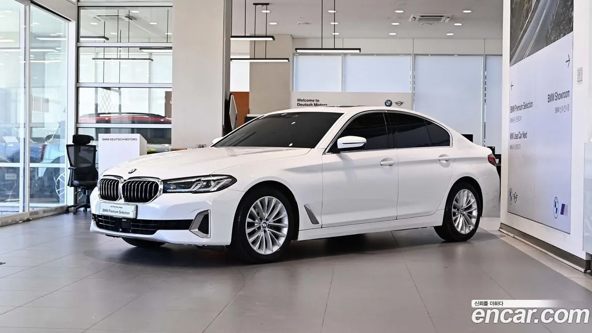 BMW 5-Series — фото 1