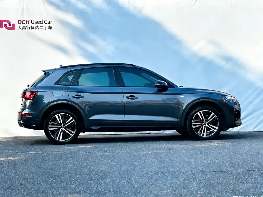 Audi Q5L — фото 9