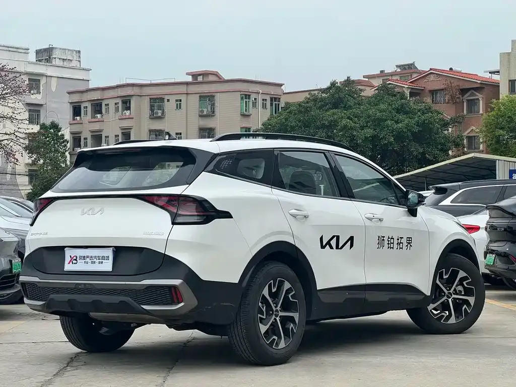 Kia Sportage — фото 9