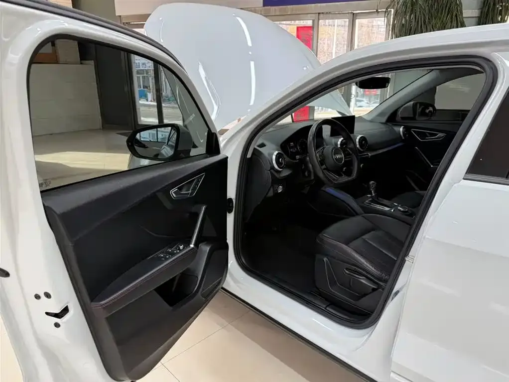 Audi Q2L 2023 из CN, фото 9