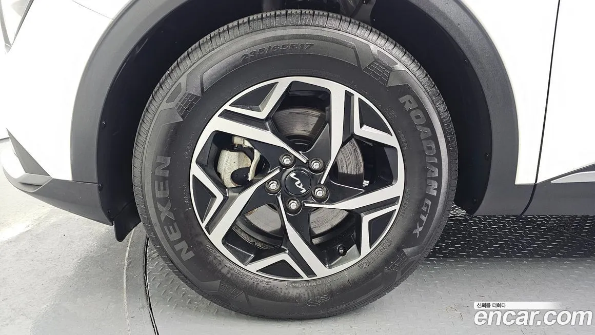 Kia Sportage — фото 10
