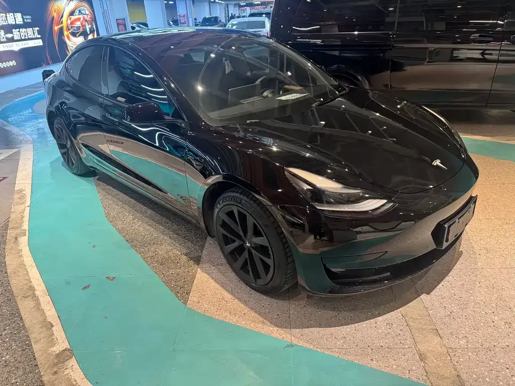 Tesla Model 3 — фото 7