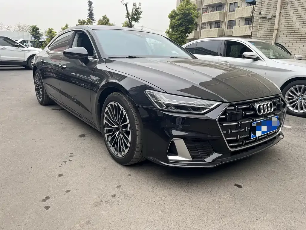 Audi A7L — фото 8