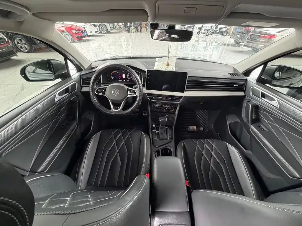 Volkswagen Tiguan L — фото 5