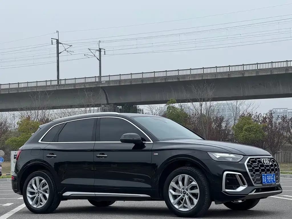 Audi Q5L — фото 8