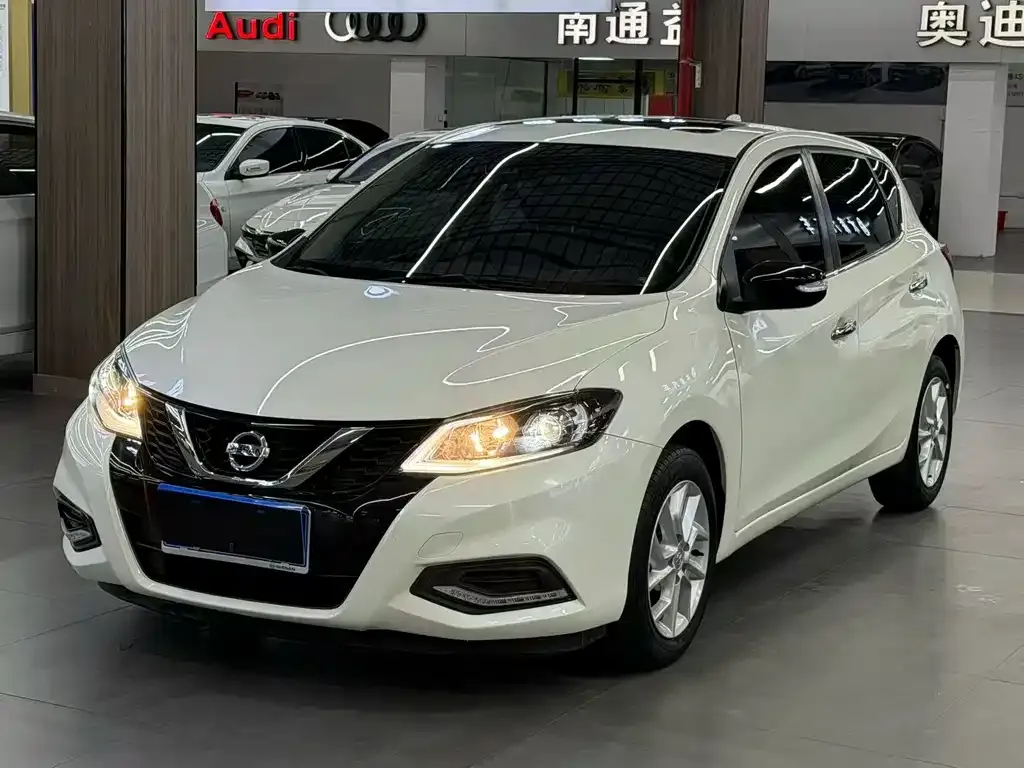 Nissan Tiida — фото 8