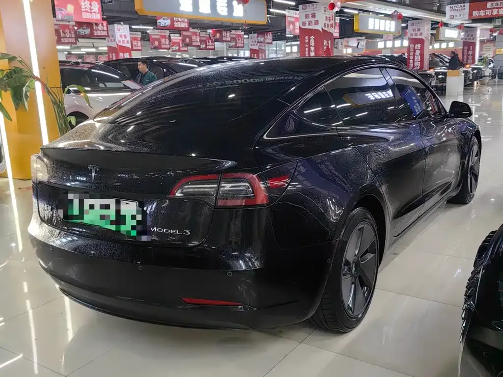 Tesla Model 3 — фото 5