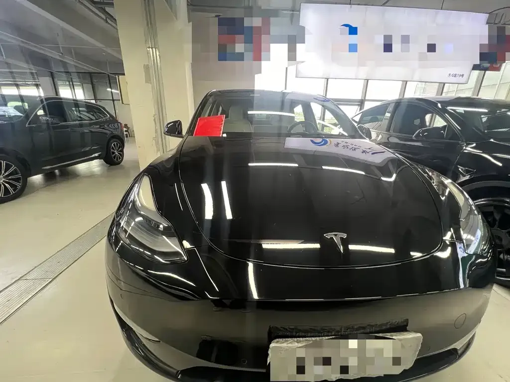Tesla Model Y — фото 7