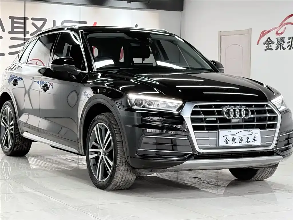 Audi Q5L — фото 6