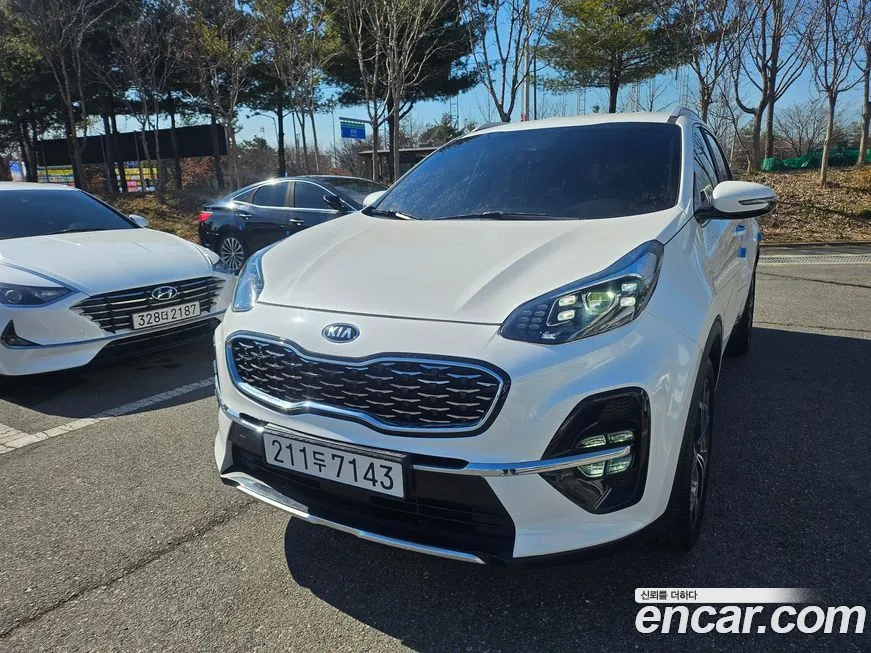 Kia Sportage — фото 1