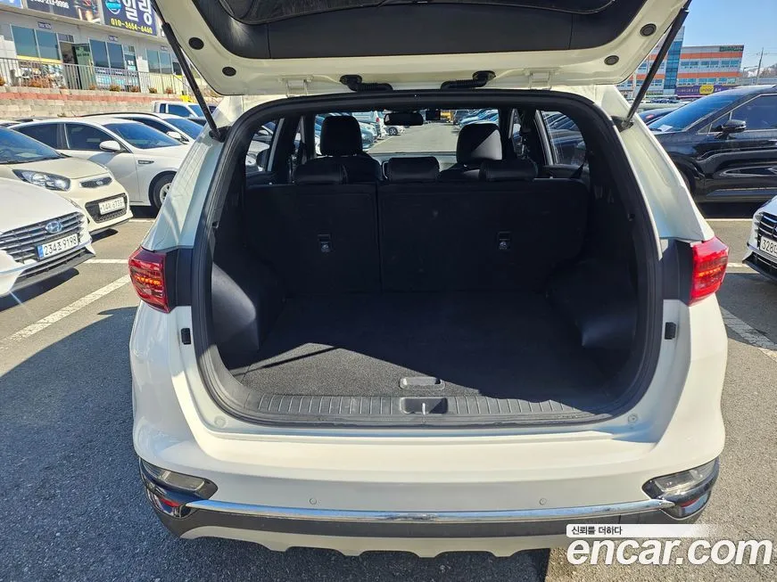 Kia Sportage — фото 7