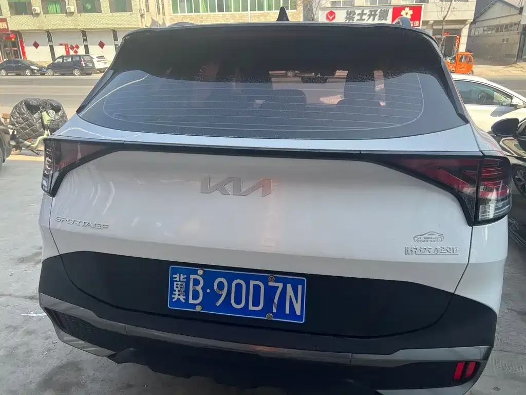 Kia Sportage — фото 7